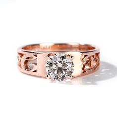 a rose gold ring with a diamond in the center