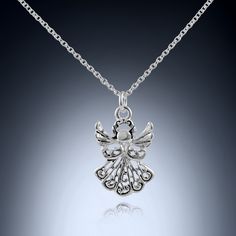 Guardian angel charm necklace in sterling silver. One of most popular gifts from Grandmothers to Granddaughters or Daddy's to their Little Angels. Silver Necklace For Valentine's Day With Gift Box, Elegant Necklace With Gift Box For Gift, Elegant Necklace With Gift Box, Elegant Gift-wrapped Jewelry For Her, Sterling Silver Jewelry With Gift Box For Mother's Day, Sterling Silver Jewelry For Mother's Day With Gift Box, Sterling Silver Jewelry In Gift Box For Mother's Day, Silver Necklace With Gift Box For Mother's Day, Silver Necklaces With Gift Box For Valentine's Day