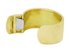 The wide, hinged bangle, in fluted high polish 18k yellow gold. Luxury Fine Jewelry With Fluted Bezel, Luxury Thick Band Bangle With Polished Finish, Luxury Wide Band Bangle With Polished Finish, Luxury Yellow Gold Jewelry With Fluted Bezel, Jewellery Marketing, Hinged Bangle, Gold Texture, Gold Design, Bangle Bracelet