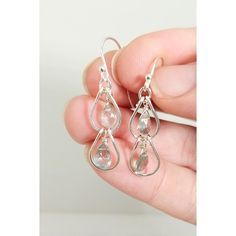 Check out our simple and elegant dangle hoop earrings! These earrings are composed of two tiers of connected teardrop-shaped hoops. Each hoop houses a single green tourmaline stone.  The total length of the earrings, including the ear hooks, measures 1.5 inches. They are lightweight and designed to sway freely! Great for everyday wearing. These earrings are made to order and with natural stone. Please keep in mind that natural stones may vary slightly in color and shape, and may sometimes have small inclusions. Each handcrafted piece of jewelry will arrive in a cute gift box with a polishing cloth to keep your jewelry looking beautiful for years to come. Please read shop announcements for any important info before placing an order. For any questions or comments, please feel free to message Delicate Hypoallergenic Teardrop Hoop Earrings, Wire Wrapped Teardrop Drop Earrings, Everyday Dangle Drop Earrings With Matching Set, Dainty Teardrop Earrings With Lever Back, Delicate Silver Teardrop Earrings, Teardrop Hoop Earrings, Dangle Hoop Earrings, Cute Gift Boxes, Handmade Gifts For Her