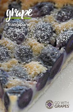 a close up of a blueberry pie on a plate