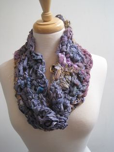 I crocheted this freeform collar/cowl/scarf from recycled overdyed lavender sari fabric. Lovely subtle shades with touches of metallic gold. 28 inches around and 5 inches long, it pulls on over your head.    See more listings at http://www.etsy.com/shop/yarningsbyseanna Follow yarningsbyseanna on Instagram. Lavender Sari, Hippie Scarf, Free Form Crochet, Scarf Art, Boho Scarf, Upcycled Fabric, Handmade Scarf, Form Crochet, Art Scarves