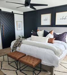 a large bed sitting in a bedroom on top of a rug