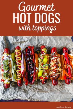 the cover of gourmet hot dogs with toppings