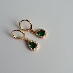 Emerald Green & Crystal Teardrop Teardrop Jewel Huggie Hoop Earrings, 14k Gold Plated Earrings, Vintage Style Earrings, Victorian Earrings  Product specifications: * Material: 14K Gold Plated Brass * Size Each charm measures 1.35 cm x 0.85cm Earring Options: * 8mm inner diameter lever back hoops (1.1cm outer diameter, 1.5cm drop) * 10mm inner diameter lever back hoops (1.3cm outer diameter, 1.6cm drop) Packaging and Gifts: * All pieces of jewellery are set on a card in a mesh jewellery pouch  Sh Emerald Green Crystal, Victorian Earrings, Vintage Style Earrings, Green Crystal, Huggie Hoop Earrings, Earrings Vintage, Style Earrings, Gold Plated Earrings, Green Crystals