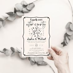 a person holding up a card with the words happily ever after party written on it