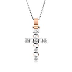 A beautiful symbol of your faith, this shimmering white and rose gold cross pendant is a look you'll wear with everything. Crafted in 18K gold, this timeless choice showcases dazzling diamonds lining a simple cross shape.  A fashionable look she'll adore and wear daily as well as on special occasions. The perfect gift for an anniversary.
2.98 carat Round cut diamonds Cross
color: D-Fclarity: VS-SI
18k white and rose gold

We offer a Free virtual Consultation from the comfort of yo Virtual Consultation, Zipper Bracelet, Cross Shape, Simple Cross, Beautiful Symbols, White Gold Chain, Gold Cross Pendant, White Gold Chains, Diamond Cross Pendants