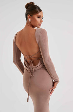 Feel sculpted and sexy in the Anastassia maxi, your new dress of dreams with long sleeves and a showstopping low back. Made from our signature double layered fabric, wear yours with loose waves and platform heels.



Colour: Chocolate.

Premium double layered fabric.

Moulds to body.

Long sleeves.

Super low back.

Tie detail at back.

Maxi length.

Model is an XS and is wearing an XS.

 Size: XS, S, M, L, XL, XXL Homecoming Dresses Corset, Midi Dress Wedding Guest, Dresses Flowy, Backless Long Dress, Layered Fabric, Maxi Dress Sale, Sparkle Dress, Dresses By Length, Loose Waves