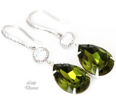 "Elegant and refreshing Swarovski Olive Green Teardrop Dangle Earrings! Green color is the great balancer of our mental, emotional and physical energies which is why there is so much green on our planet. It is also the color of growth, the color of spring, of renewal and rebirth. Earrings made with: - 18x13mm genuine Olivine Green Swarovski teardrop pear shaped fancy stones, set in sterling silver plated settings - Hypoallergenic Rhodium plated rhinestone ear hooks - sparkling cubic zirconia con Teardrop Bridal Earrings, Bridal Earring, Fancy Stones, Green Bridesmaid, Teardrop Dangle Earrings, Yellow Earrings, Earrings Green, Swarovski Crystal Earrings, Swarovski Earrings