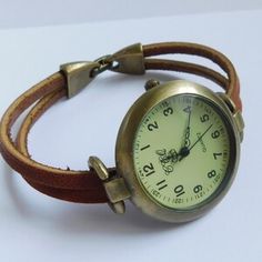 Leather Watch for Women. Women's Wristwatch. Simple Watch. - Etsy Everyday Vintage Jewelry With Leather Strap, Vintage Leather Strap Jewelry For Everyday, Minimalist Brown Watch As A Gift, Minimalist Brown Watch As Gift, Everyday Vintage Watch, Gift Jewelry With Leather Strap And Round Dial, Handmade Vintage Watches, Vintage Everyday Watches, Vintage Brown Leather Watch Accessories For Everyday Use