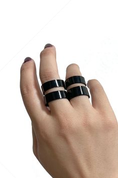 LIMITED EDITIONHandmade in deadstock patent leather, these rings are the perfect lightweight accessory to add a modern, unique touch to your outfit. Each ring has a double band with a gap in the middle and is secured with a single gunmetal rivet around the back. Offered in black and oxblood -- and only available until materials run out! Slow Fashion, Natural Fibers, In The Middle, The Middle, Patent Leather, Custom Sizing, Gap, Limited Edition, Band