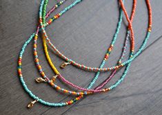 "These are very simple, colorful and dainty little additions to any outfit. Super fun for layering too. Each necklace is a separate combination of colorful seed beads with glass beads, gold hematite beads, a really pretty (tiny) gold filled conch charm and finished with gold filled clasp and findings.  Necklaces measure just shy of 17 1/4\"   (Please see last photo for available choices. Only one of each available). Visit my shop here: https://www.etsy.com/shop/uniquebeadingbyme?ref=seller-platf Beaded Necklace Designs, Beaded Necklace Diy, Diy Bracelets Patterns, Hematite Beads, Beaded Accessories, Seed Bead Necklace, Gorgeous Bracelet, Beaded Necklaces, Beaded Stretch Bracelet