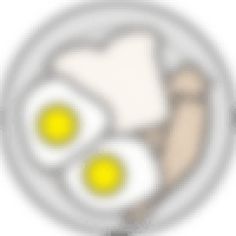 two eggs are in the middle of a white circle with yellow dots on it's side