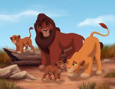 the lion family is standing in the dirt