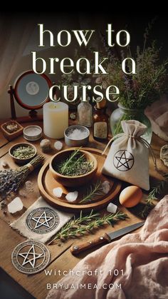 the cover of how to break a curse, with herbs and other items on a table