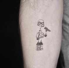 a man's arm with a star wars tattoo on it