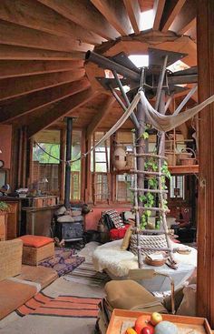 a living room filled with furniture and lots of wood