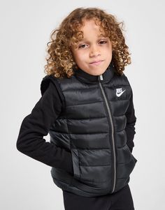 Freshen up their layers with this children's Seamless Quilted Gilet from Nike. In a Black colourway, this vest is made with smooth, durable woven poly fabric for lasting wear. It has a lightweight insulation to lock in the heat, and features a full-zip fastening with a stand-up collar for added coverage. With pockets up front, it's finished with bold Nike branding throughout. Quilted Gilet, Nike Branding, Nike Brand, Black Nike, Jd Sports, Black Nikes, The Heat, Stand Up, Insulation