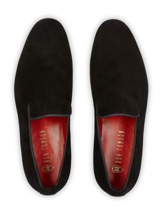 This plush black version of the timeless 'loafer' has been hand crafted from flawless suede leather, embellished with a leather insole that nods to the brand's heritage. Perfectly paired with a tailored suits, leather jackets or a tuxedo on a red carpet. Stacked heel. Leather Lining for a luxurious feel and moisture control Leather sole Tapered round toe. Slip-on style. The handmade leather outsole and insole are Made in Italy. STYLE #32399 Black Tassel Loafers With Leather Sole, Black Slip-on Tassel Loafers With Leather Sole, Black Plain Toe Loafers With Leather Sole, Black Slip-on Tassel Loafers With Moc Toe, Luxury Suede Slip-ons For Galas, Business Black Suede Loafers, Luxury Black Slip-on Moccasins, Classic Black Slip-ons With Contrast Sole, Black Suede Slip-ons For Business