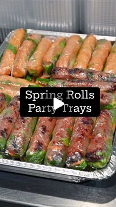 spring rolls and party trays are ready to be served in the oven for guests