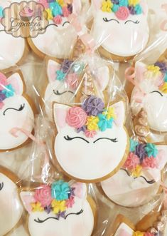 some decorated cookies in the shape of unicorns