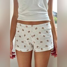 Soft Cotton Sweatshorts With An Elastic Waistband. Fabrics: 100% Cotton Measurement: 8" (20cm) Rise, 2.5" (6cm) Inseam, 28" (71cm)Waist (Stretches) Made In: Italy Brandy Melville Emery Shorts, Brandy Shorts, Brandy Melville Shorts, Waist Stretches, Xmas List, Cotton Shorts, Brandy Melville, Brandy, Pajamas