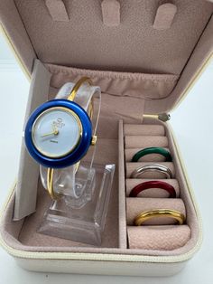 Enter the promo code INVENTORY to get a 20% discount on your purchase. **Authentic Gucci 5 Bezel Watch** **Pre-loved, good condition** - Made in Italy - Currently meets timekeeping standards - Evaluated by a Watch Specialist - Fits up to a 5.75-inch wrist - Crystal glass has very tiny hairline scratches, but they are unnoticeable when wearing - Comes with metallic gold, silver, green, red, and blue bezels, and a jewelry box as seen in the photos Please check all photos for the actual size and co Luxury Timeless Collectible Watch Bands, Bezel Watch, Bangle Watches, Gucci Watch, Insurance Coverage, Women Wrist Watch, Watch Movement, Christmas Wishlist, Metallic Gold