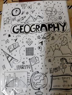 a piece of paper with drawings on it and the words geograph written in black ink