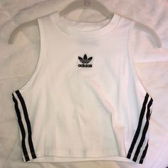 Adidas Tank Top. New, Never Worn. It Is In Excellent Condition. Selling Because It Is Too Big On Me. Sporty White Tank Top For Spring, White Athleisure Crop Top For Streetwear, Adidas Cotton Tank Top For Spring, White Sporty Crop Top For Spring, Sporty White Crop Top For Spring, White Cotton Sports Crop Top, Adidas Sporty Cotton Tank Top, Adidas Casual Summer Tank Top, Casual Adidas Summer Tank Top