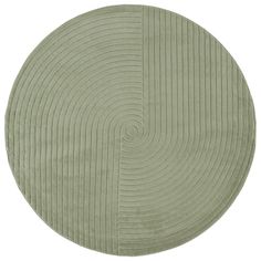 a round rug with wavy lines on the center and bottom, in light green color