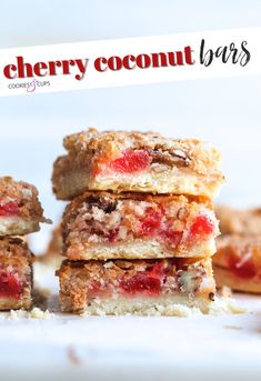 a stack of strawberry shortbreads sitting on top of a white table next to each other