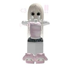 a small doll is standing in front of a white background and has her hands on her hips