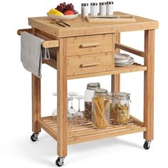 a kitchen island cart with two drawers and plates on the bottom shelf, holding wine glasses