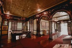 an ornately decorated room with wooden floors and walls