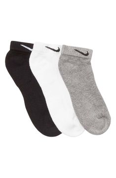 Low ankle cut socks feature a ribbed arch and lightly cushioned sole for everyday comfort. Pack of 3 Low ankle cut Swoosh logo Assorted colors or solid Knit construction Ribbed arch Cushioned footbed Solid: 70% cotton, 27% polyester, 2% spandex, 1% nylon; Heathered: 53% cotton, 44% polyester, 2% spandex, 1% nylon Machine wash warm, tumble dry low Imported Sock Packs, Swoosh Logo, Clutch Pouch, How To Make Shoes, Casual Socks, Short Rompers, Men Shoes Size, Ankle Socks