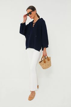 An ideal style for running errands, grabbing lunch with friends, or shopping around town, the Navy Knit Declan Pullover is effortless and oh-so-classic. This slightly boxy top boasts quarter-length sleeves, a front lace-up tie closure, and a curved hem, this stunner checks all the boxes. Pair with denim shorts and sneakers or layer it over a striped-tee and your favorite tee for a playful yet chic everyday look. V-neckline Front lace-up closure Quarter-length sleeves Curved hem Boxy fit Medium w Lunch With Friends, Boxy Top, Plus And Minus, The Navy, Striped Tee, Soft Knits, Get The Look, Running Errands, Everyday Look