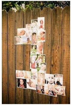 a wooden fence with pictures hanging on it