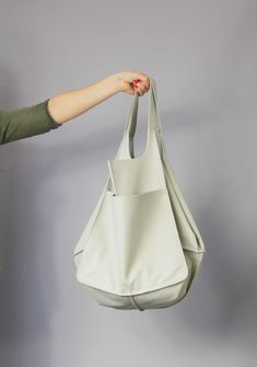 "Leather hobo purse Hobo bag Classic slouchy hobo purse beige leather Soft Natural Leather Large Capacity Every Day Bag Weekender bag Light grey oversized bag - large leather tote bag. Unikque model. Large and stylish tote bag made from high quality leather. Spacious interior provides room for all the daily essentials and more. It is large enough to hold all your weekend essentials. This bag is perfect as your everyday bag, which can fit an IPAD, A4 files, books, magazines, cosmetic bag as well Large Capacity Hobo Bag For Errands, Everyday Hobo Bucket Bag, Everyday Reversible Hobo Bag, Reversible Hobo Bag For Travel, Everyday Hobo Satchel With Pockets, Hobo Bag With Removable Pouch, Reversible Hobo Bag For Daily Use, Everyday Reversible Pouch Shoulder Bag, Reversible Pouch Shoulder Bag For Everyday