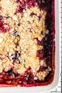 blueberry cobbler in a baking dish with crumbled topping