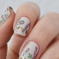 Nail Art by Amber on Instagram: "Spring Wildflowers 🌼 This design took two days to create and went through a few changes before this final look. I'm so happy with how it turned out. Wild and blooming with Spring. . . . Products Used: @zoyanailpolish 'Althea', 'Ireland', 'Ness', 'Honey', 'Austin', 'Mira', 'Tina', 'Shannon', 'Naked Manicure' Glossy top coat  . @ellamila 'Stonehearted' . 5mm nail art brush . . . . . #nails #nailart #naildesigns #springnails #nailstagram #flowernails #nailinstagram #floralnails #glossynails #nailgram #freehandnailart #amber_nailart" Happy Nail Ideas, Wildflower Nail Art, Wild Flower Nails, Nature Nail Art, Wildflower Nails, Cheesy Lines, Garden Nails, Minimal Nails Art