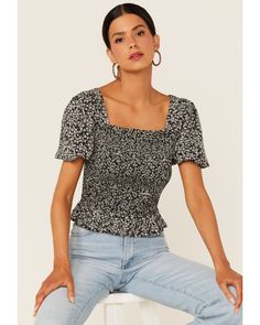 Beyond The Radar Women's Ditsy Floral Print Smocked Shirt, Black Fitted Ditsy Floral Print Tops For Spring, Fitted Blouse With Ditsy Floral Print For Fall, Chic Smocked Short Sleeve Top For Fall, Chic Short Sleeve Smocked Top For Fall, Trendy Smocked Back Short Sleeve Top, Casual Smocked Top With Smocked Bodice For Fall, Casual Fall Smocked Top With Smocked Bodice, Fitted Smock Tops For Fall, Casual Smock Top For Day Out