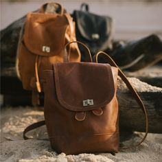 Handcrafted slowly and ethically from our small studio based at the foothills of the Himalayas. The Mini Foldover Backpack is designed to carry your essentials with ease. Whether it’s tackling a new adventure or marking things off your bucket list, this backpack is guaranteed to be your perfect companion. PRODUCT DETAILS: Size: L - 7”, H - 9”, D - 4”, adjustable straps - 36” Materials: recycled leather Lining: hand block printed cotton canvas Print: mini diya Care: spot clean only with soft, cle