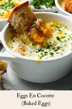 eggs en cocotte baked egg soup in a white bowl with bread on the side