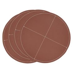 three brown circles with white stitching on them