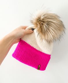 "Don't get lost in this bright pink double brim knit hat! Available for women, kids and baby! ~ Double brim designed for extra warmth ~ Soft acrylic/wool blend yarn ~ Attached faux fur pom pom ~Attached leather tag Sizing: ~ 0-6 Months: 13-15\" ~ 6-12 Months: 15-17\" ~ 1-3 Years: 17-19\" ~ 4-9 Years: 19-21\" ~ Adult: 21\"-23\" Cleaning Instructions: Spot clean only. Do not machine wash as this item contains wool WARNING: This item contains small parts which can pose as a choking hazard to small children. Never leave your child unattended with this item. This item is handmade, and not always able to withstand baby and toddler hands. Lakeside KnitsCo is not responsible for any damage cause to this item by your child" Knitting Machine Hat Patterns, Double Brim Knit Hat, Addi Knitting Machine, Knit Winter Hat, Diy Gifts For Men, Woolen Cap, Circular Knitting Machine, Knitting Machine Patterns, Knitting Machine Projects