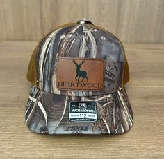 Whether they're seasoned hunters or eager newcomers, our elk hunting hat is the perfect accessory for every journey into the wilderness. It's more than just headwear; it's a symbol of dedication, the love for the hunt, and the thrill of pursuing one of the most majestic game animals. This hat make a statement at every celebration, bringing a touch of the outdoors to birthdays. The leather-like patch captures the essence of elk hunting adventures--mountains climbed, trails traversed, and the camaraderie that forms under the vast open sky. Give the gift of a hunting style, crafted for those who find solace in the quiet moments of nature and the adrenaline of a successful elk hunt. Our elk hunting hat is the perfect birthday surprise for the outdoorsmen who appreciate the beauty of the wilder Brown Hunting Hat With Leather Patch, Brown Hunting Cap, Brown Leather Patch Hunting Hat, Brown Snapback Trucker Hat For Hunting, Brown Hunting Snapback Cap, Brown Snapback Hunting Cap, Brown Snapback Cap For Hunting, Brown Snapback Hat For Hunting With Flat Bill, Brown Snapback Hat For Hunting