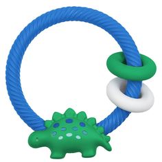 a green and white toy with a blue ring around it