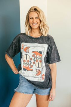 Did we just find your new favorite graphic? Yeah, we totally did.The Poker Face Graphic Tee is sure to be another favorite in your closet. Made with a washed, soft 100% cotton fabric and oversized fit, you'll feel comfortable while the card graphic is equal parts cute and edgy. Pair with baggy jeans for a casual weekend look or leather pants for an sassy night out vibe. Will ship 9/1. Very Oversized Fit 100% Cotton Hand Wash Cold, Hang Dry Crew Neckline Mineral Washed - Distressing Face Graphic, Poker Face, Concert Looks, Casual Weekend, Vintage Graphic, Vintage Graphics, Baggy Jeans, Best Seller, Oversized Fits