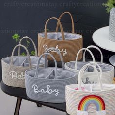 four baskets with the names baby on them