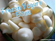 frozen yogurt bites in a bowl with the words frozen yogurt bites